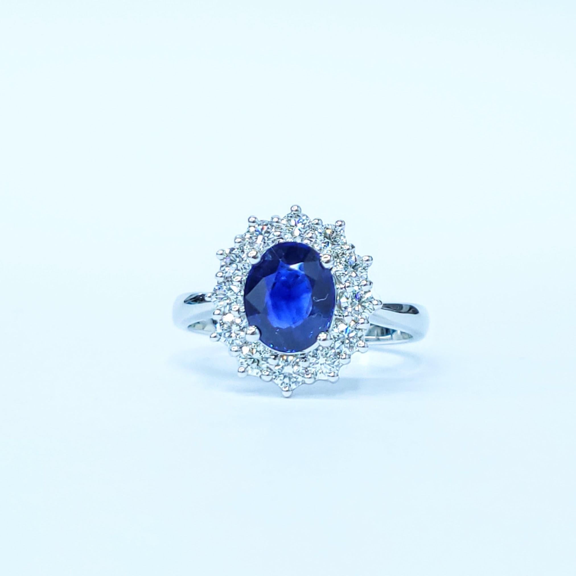 Modern IGI Certified 1.23 Carat Blue Sapphire & Diamond Ring in 18K White Gold For Sale