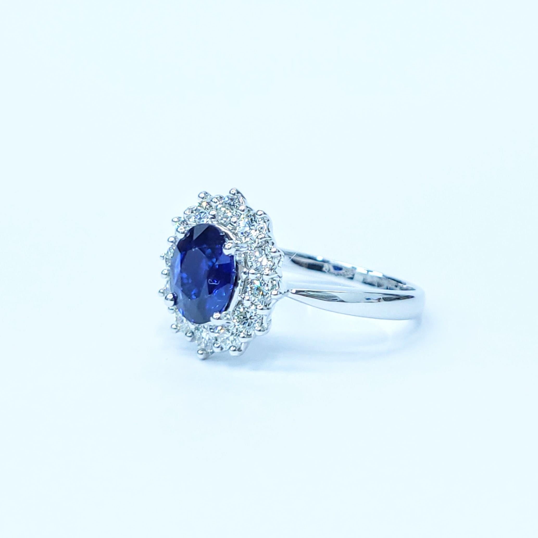Oval Cut IGI Certified 1.23 Carat Blue Sapphire & Diamond Ring in 18K White Gold For Sale