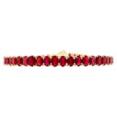 IGI Certified 12.46 Carat Natural Rubies 14k Yellow Gold Bracelet