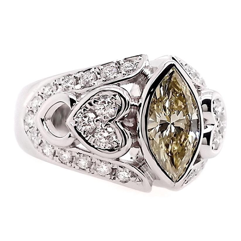 IGI Certified 1.24ct Natural Fancy Yellow Diamond Platinum Ring For Sale 2