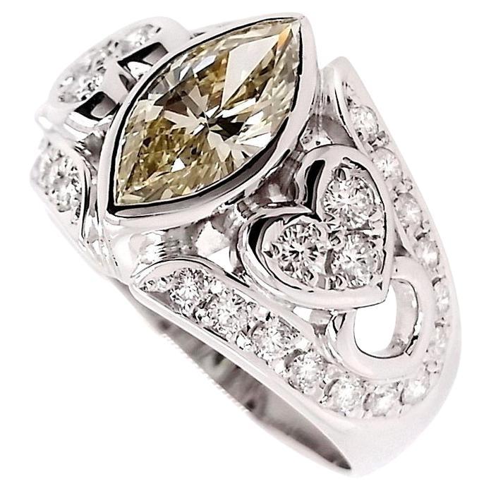 Anillo de platino con diamante amarillo fantasía natural certificado IGI de 1,24 ct