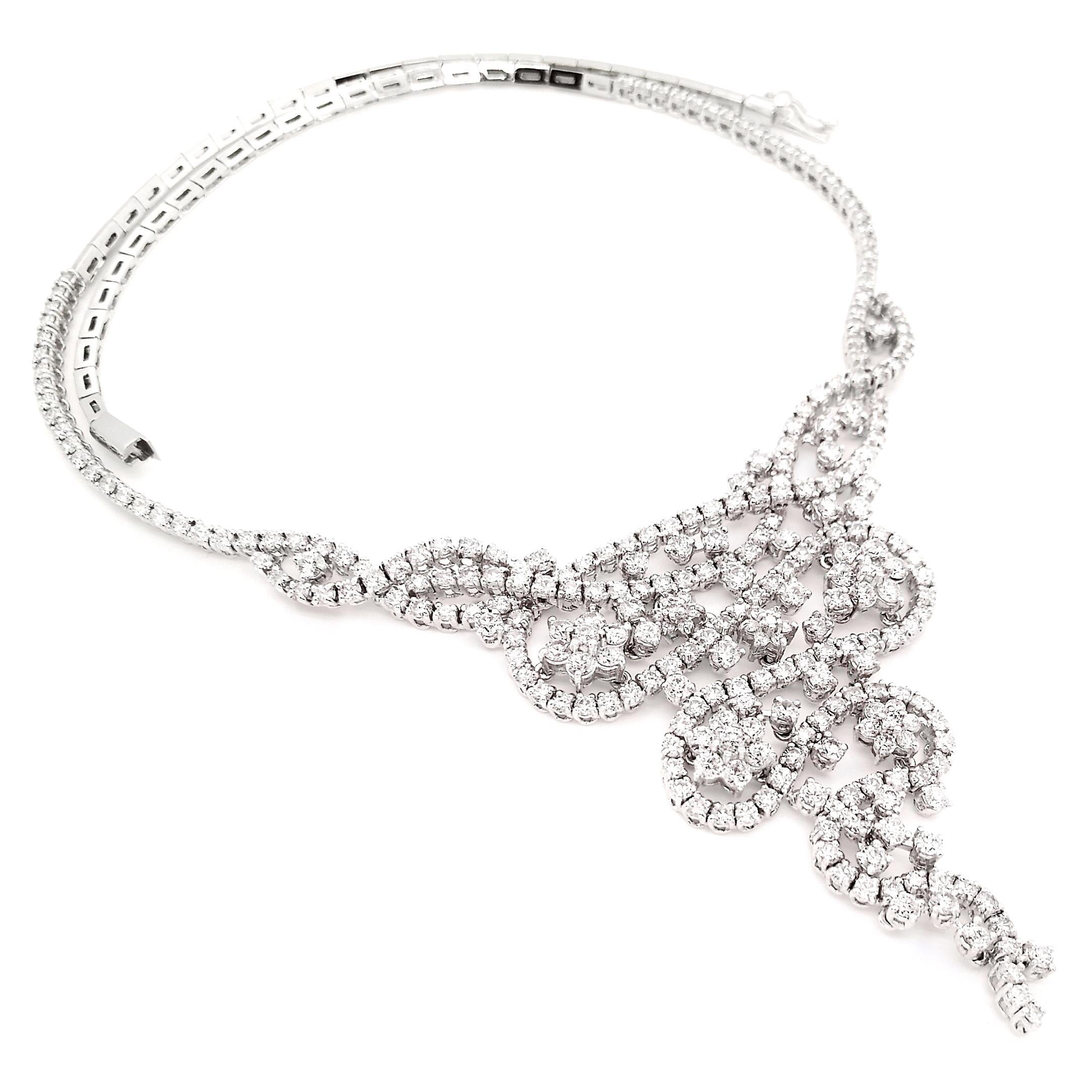 Step into the extraordinary with this exquisite 18K white gold necklace adorned with a stunning array of 285 round brilliant natural diamonds. Its opulent unique design is a true spectacle, majesty and elegance that leaves an unforgettable
