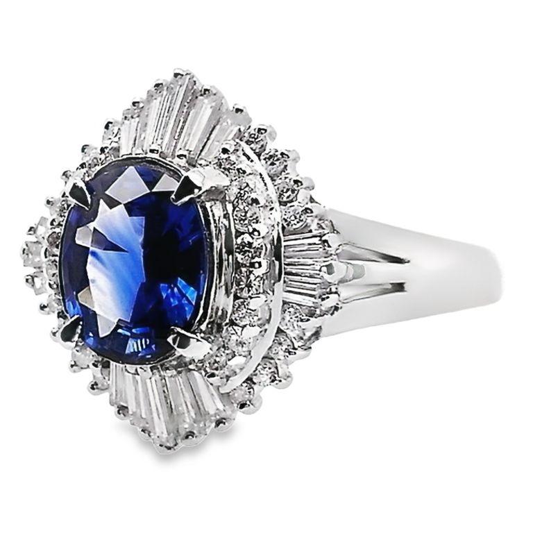 Oval Cut IGI Certified 1.30ct Vivid Blue Sapphire 0.50ct Natural Diamonds Platinum Ring For Sale