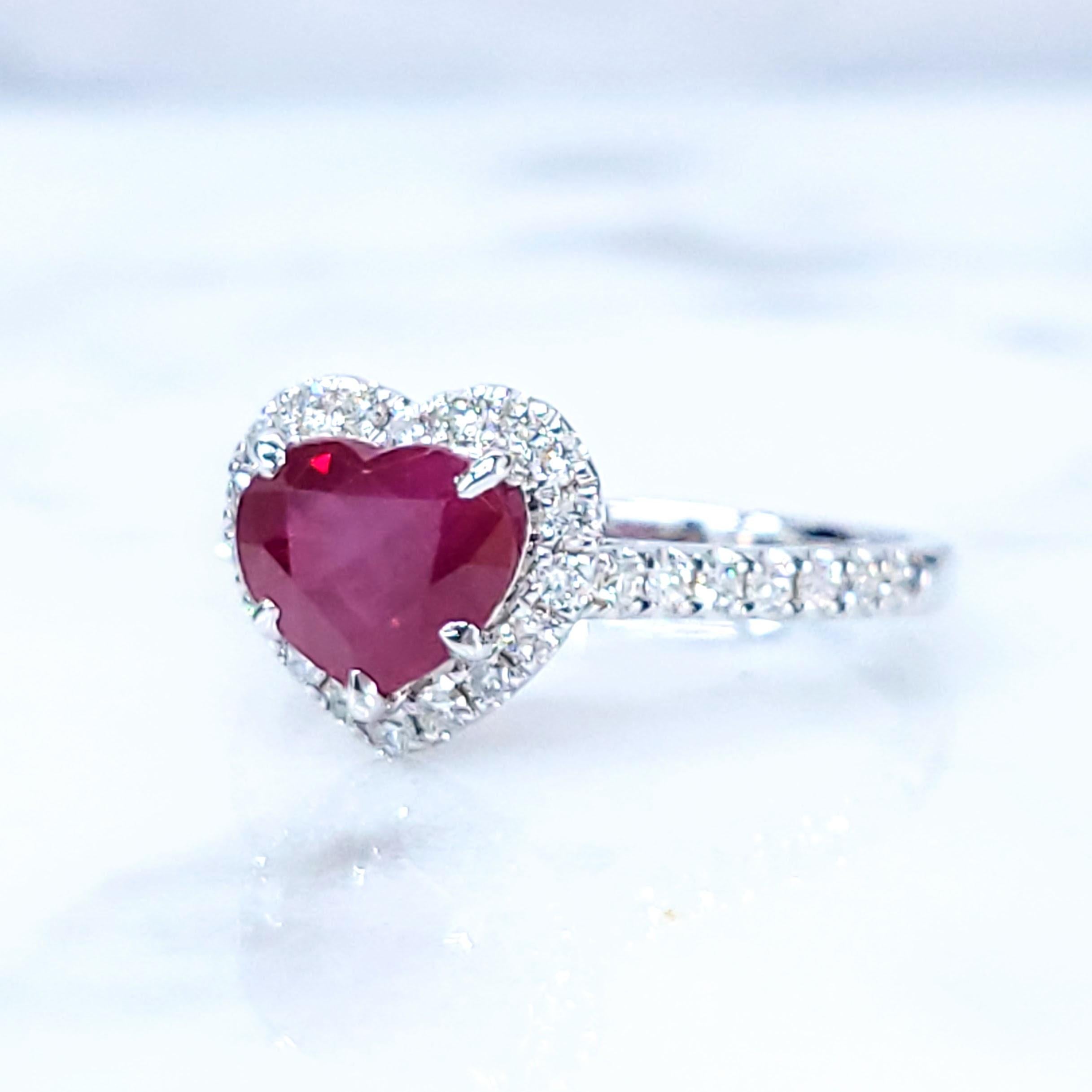 Imagine presenting your loved one with a symbol of your affection as radiant and unique as your love itself. This exquisite ring features a breathtaking heart-shaped ruby, a true testament to romance and passion. The ruby, a substantial 1.33 carats,