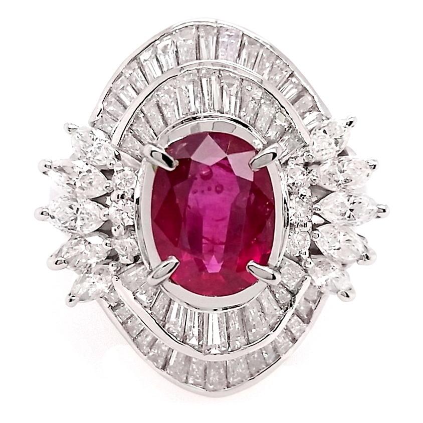 Dive into the depths of luxury with this mesmerizing 1.34 carats oval-shaped natural ruby ring, adorned by 68 sparkling diamonds and exquisitely nestled in a platinum setting. Embrace the extraordinary with this exquisite piece, a symbol of enduring