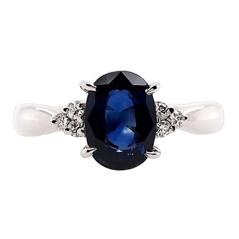 Elevate your style with this stunning platinum ring, showcasing a mesmerizing 1.36ct natural deep blue sapphire, delicately complemented by 0.08ct of sparkling diamonds. A refined masterpiece of minimalist elegance, this 4.22-gram treasure is