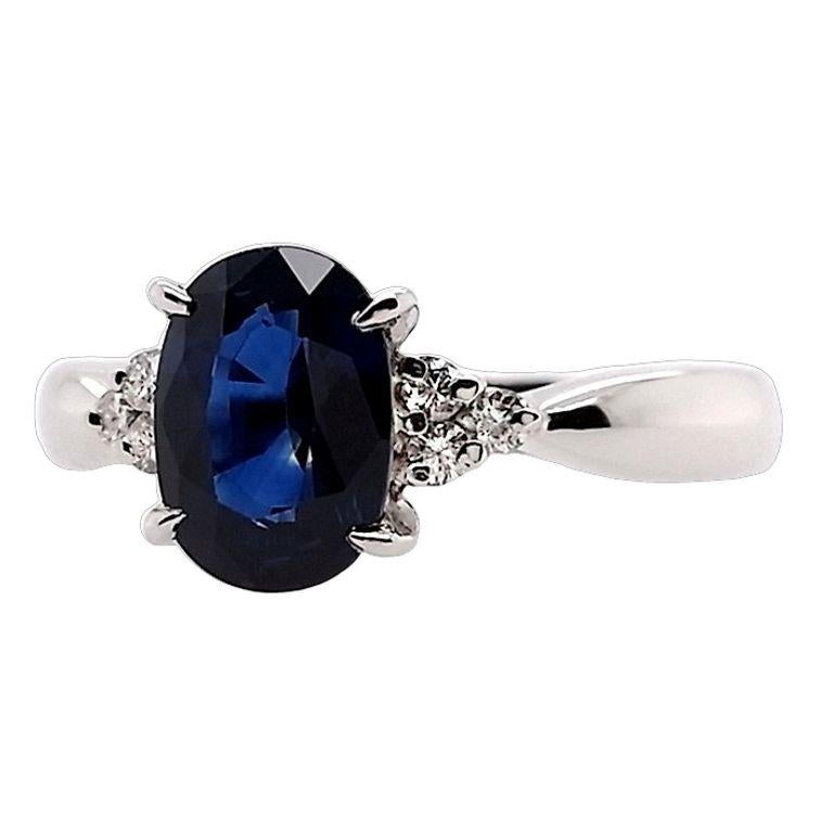 Oval Cut IGI Certified 1.36ct Natural Sapphire and 0.08ct Natural Diamonds Platinum Ring