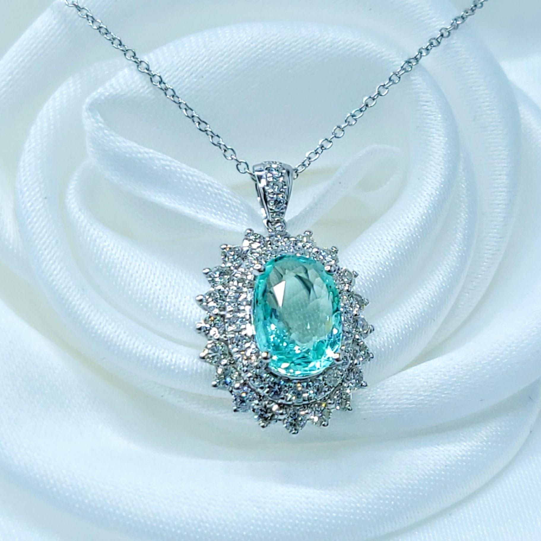 Taille ovale Paraiba et diamant certifiés IGI de 1,43 carat en or blanc 18 carats en vente