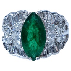 IGI certified 1.43 Carat Vivid Green Emerald & Diamond Ring