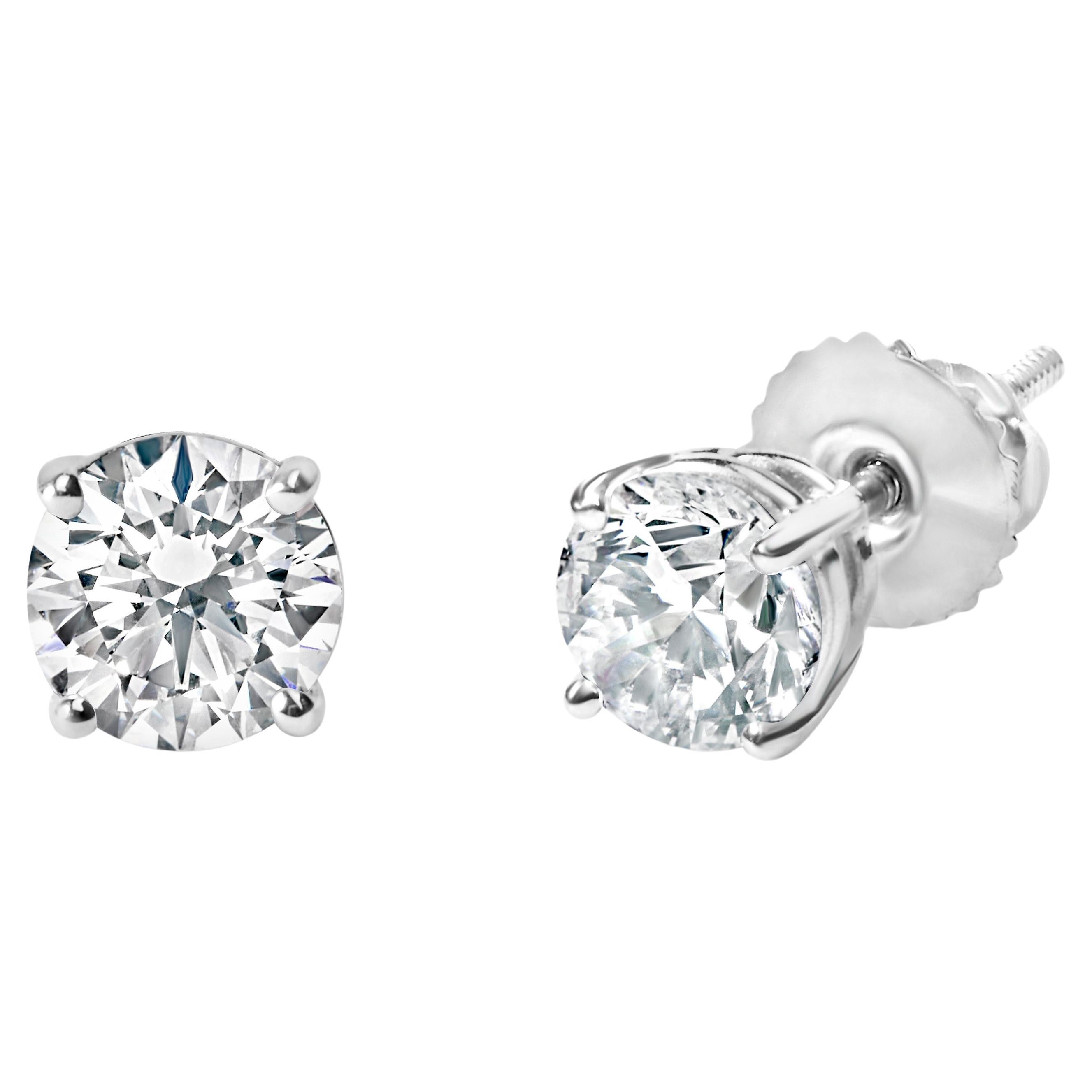 IGI Certified 14K White Gold 1 1/2 Carat Round Diamond Solitaire Stud Earrings For Sale