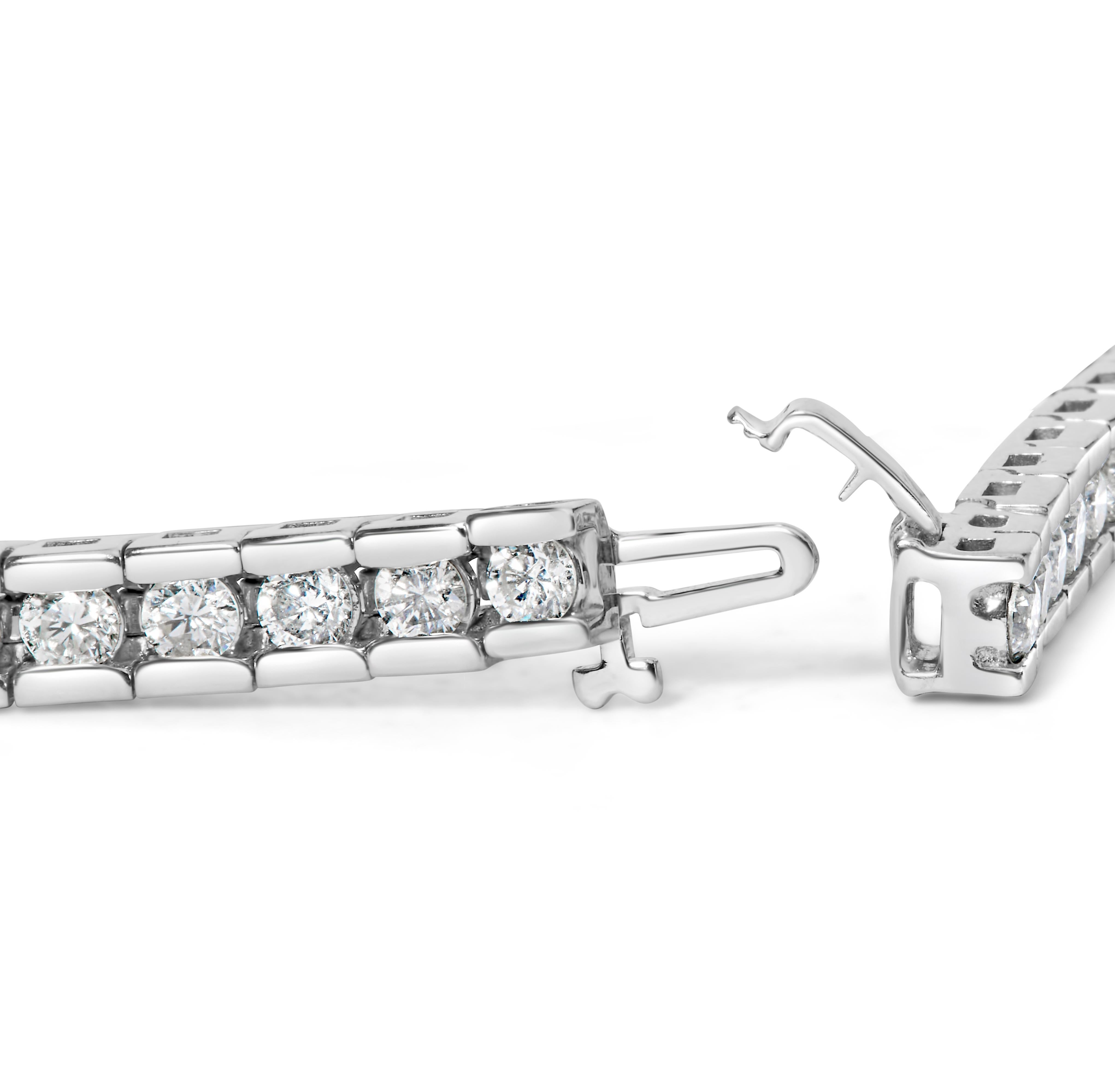 Timeless beauty presents itself in fine form in this gorgeous diamond tennis bracelet. Crafted in polished 14K white gold, this bracelet features 43 glimmering round diamonds of 6 total cttw, each with a color grade of I-J and a clarity of I1-I2.