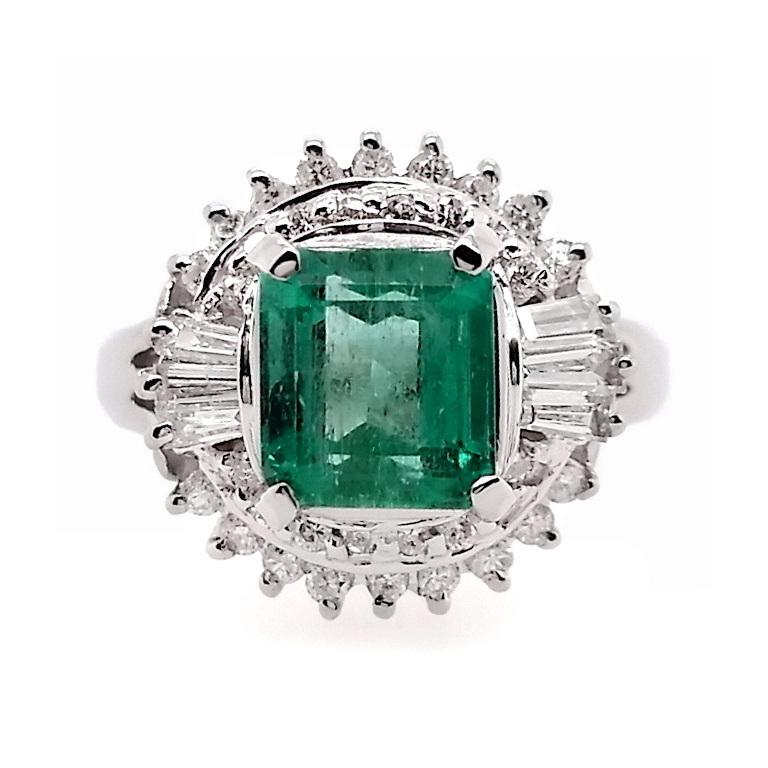 Stunning 1.50 carats Colombian emerald platinum ring adorned with 40 natural diamonds, a timeless symbol of elegance and luxury. Impeccable craftsmanship, vibrant gemstones, and intricate detailing make this ring a perfect statement piece.

This