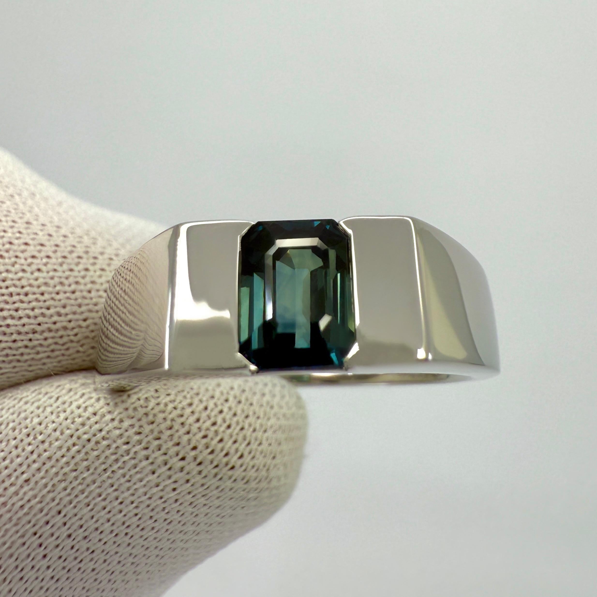 IGI Certified Unique Natural Blue Untreated Sapphire Platinum Solitaire Signet Band Ring.

Unique 1.53 Carat sapphire with a beautiful teal blue colour and excellent clarity, very clean stone. The sapphire also has a unique fancy tapered emerald cut