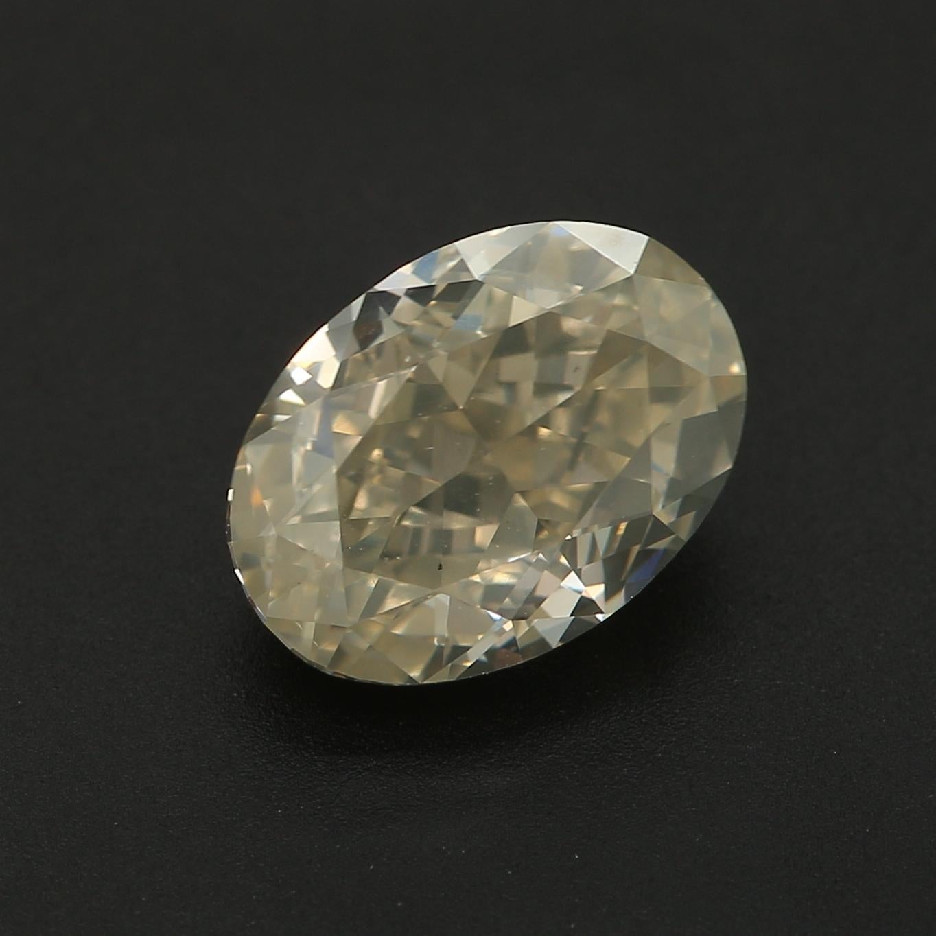 Certificate: IGI
Report Number: 534245983
Shape And Cut: Oval
Carat Weight: 1.78 carat
Measurements: 8.31 x 6.04 x 4.35 mm
Color Grade: M Colour

FEATURES OF THE DIAMOND:

This M color diamond has a faint yellow or brown tint, placing it toward the