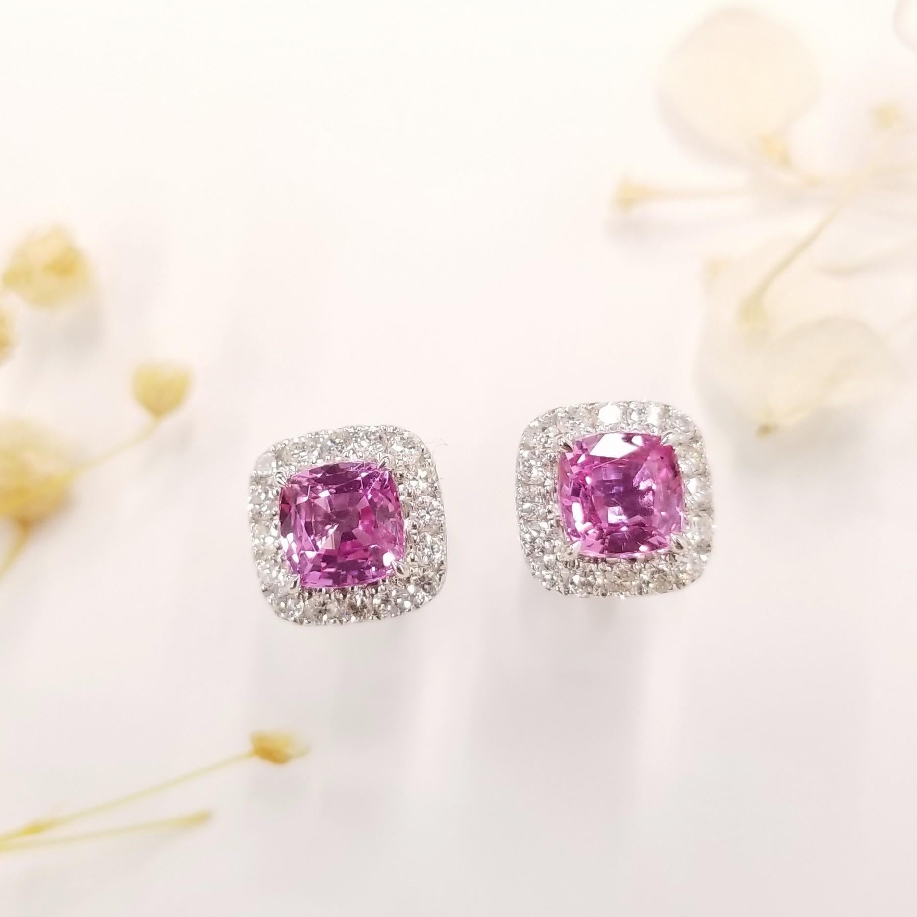 Crafted with meticulous attention to detail, these earrings feature two exquisite pink sapphires, each weighing approximately 0.89 carats. The pink sapphires showcase a vibrant and alluring hue, adding a touch of femininity and grace to the overall