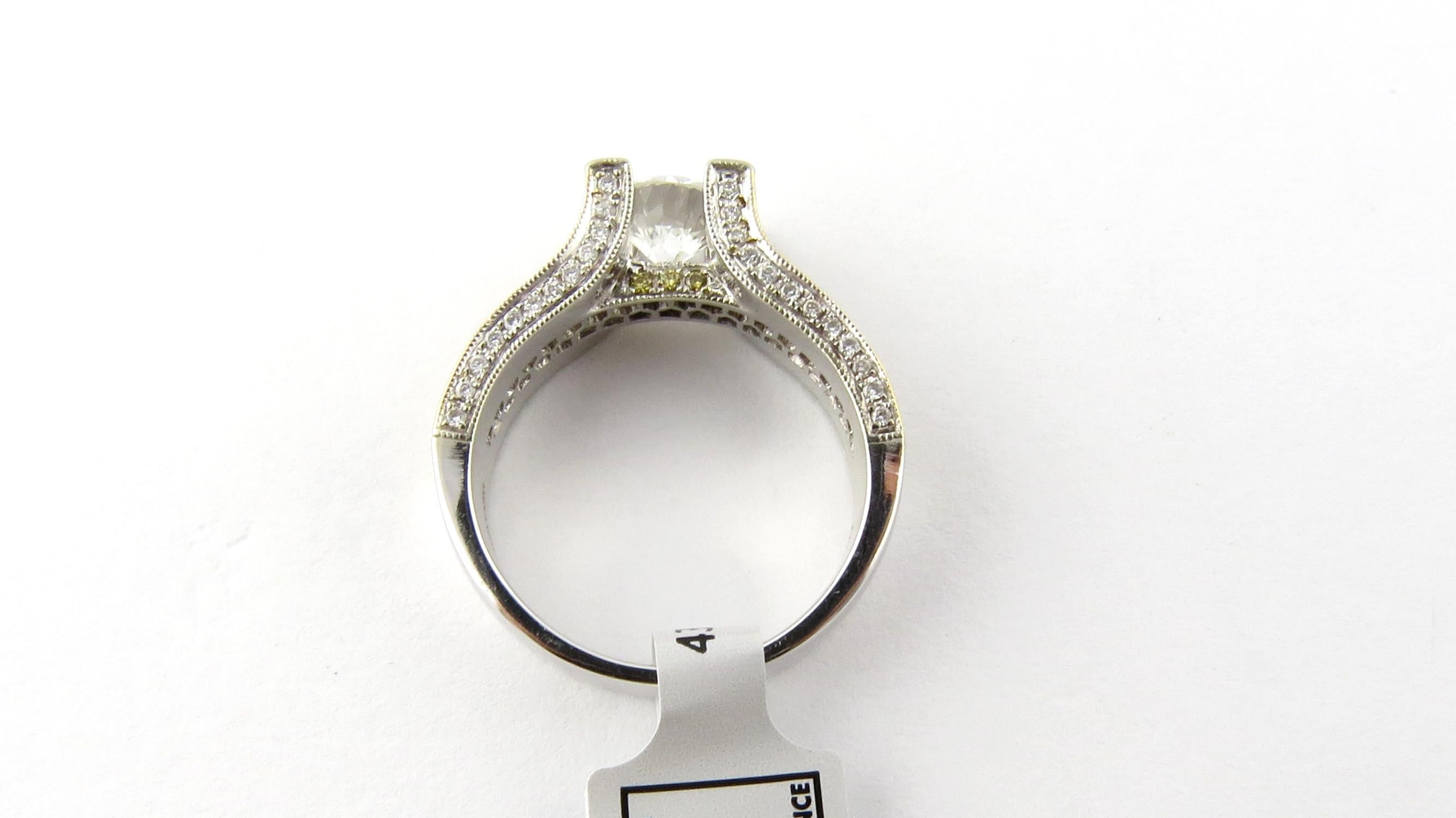 Round Cut IGI Certified 18 Karat White and Gold Natural White and Yellow Diamond Ring