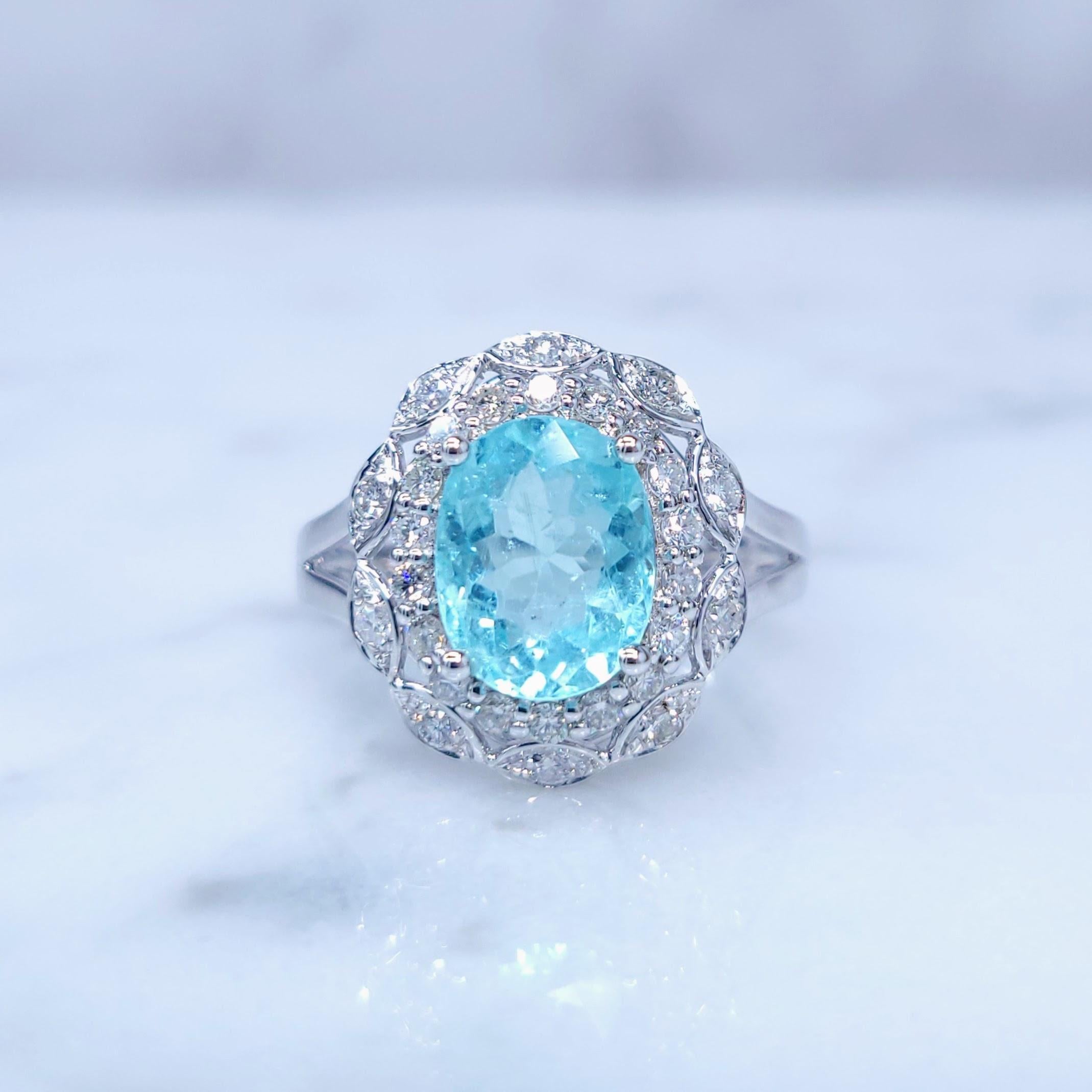 Oval Cut IGI Certified 1.85 Carat Paraiba & Diamond Ring in 18K White Gold For Sale