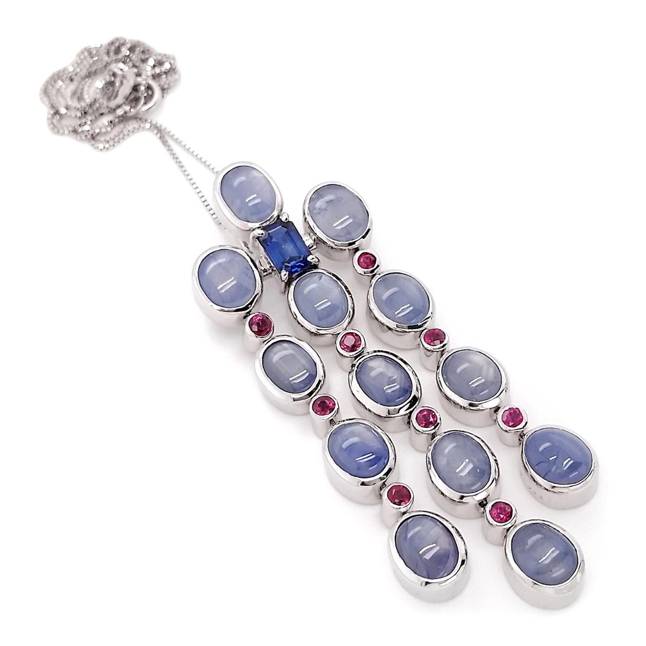 Beautiful 18K White Gold Necklace with a stunning pendant, showcasing an extraordinary combination of rare gemstones.
Centrepiece: 13 Natural Untreated Star Sapphires totalling 17.07ct, in oval cabochon cuts, featuring a Greyish Blue to Violetish