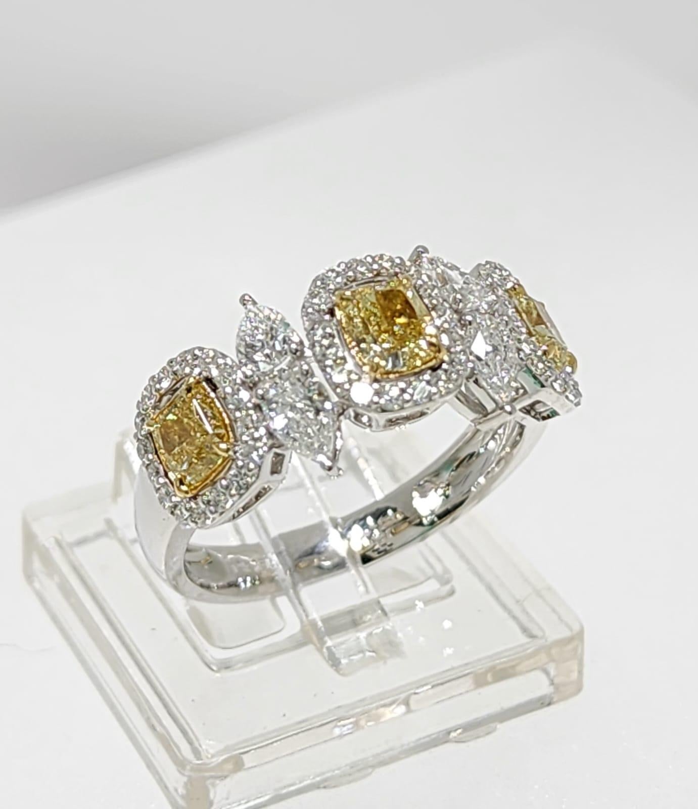 Contemporary IGI Certified 1.87 Carat Yellow Diamond Fancy Diamond Rings in 18K White Gold For Sale