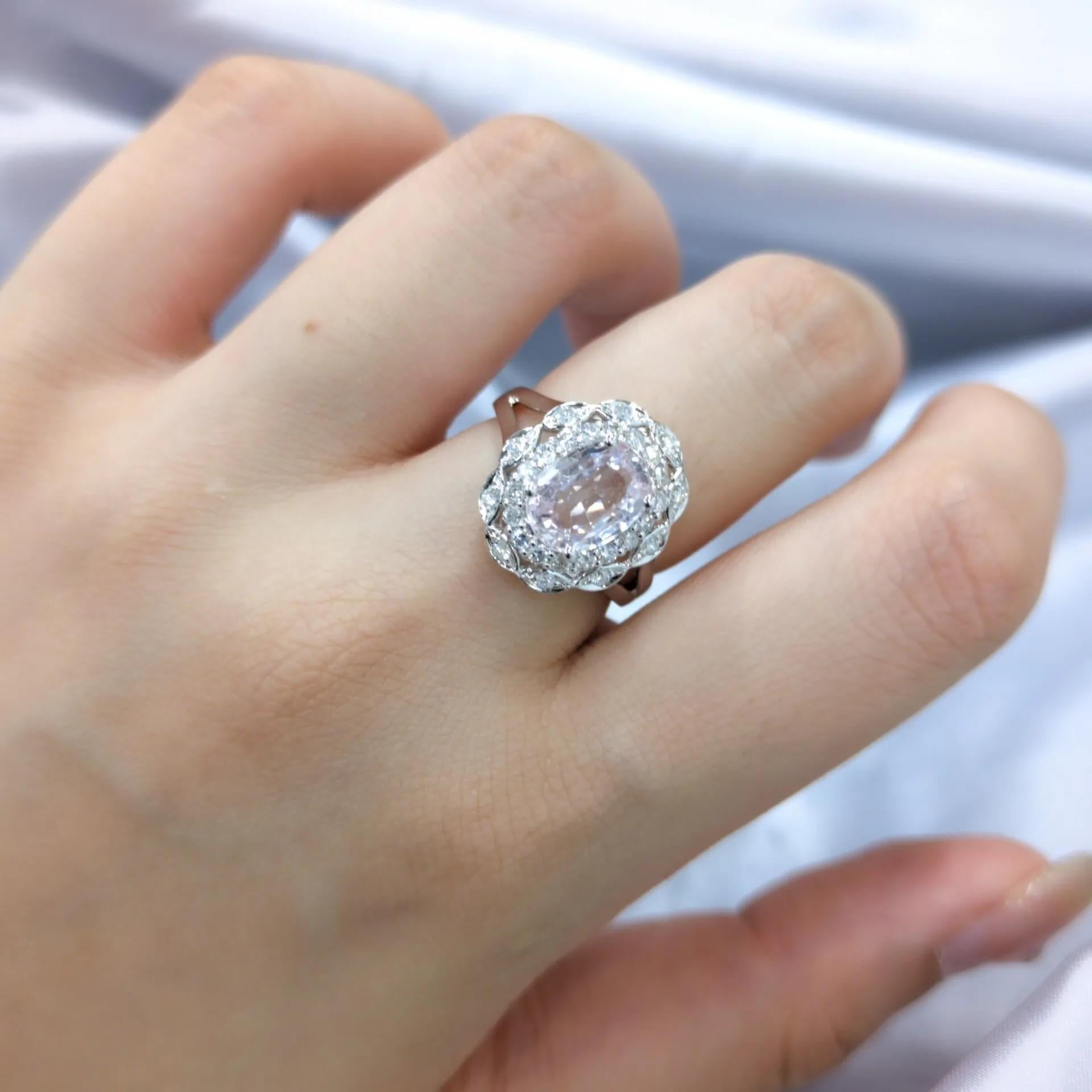 Imagine owning a piece of the earth's purest artistry, a natural pink sapphire of exceptional rarity and provenance. This 1.89-carat oval mixed cut gem is not only breathtakingly beautiful but also remarkably unique, being a completely unheated