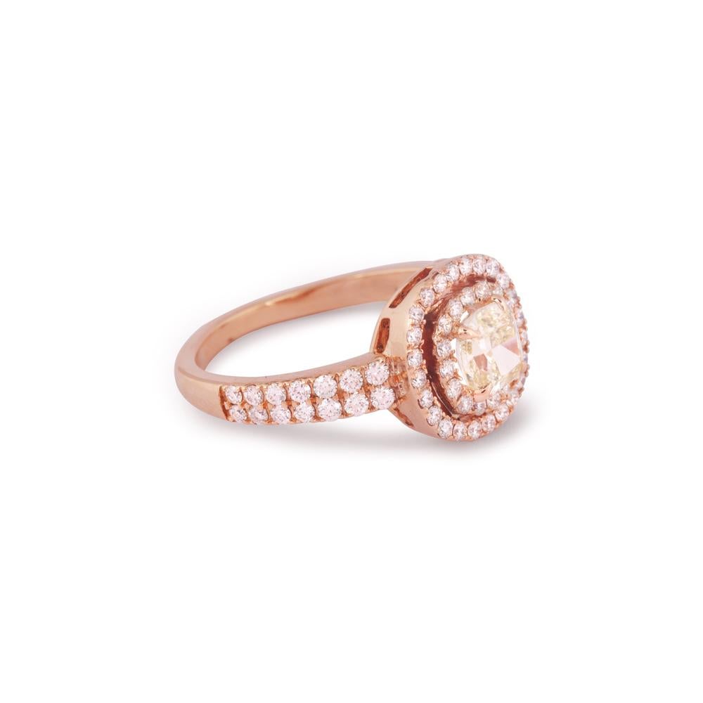 Crafted in 4.25 grams of 18-karat Rose Gold, The Duffo Ring contains 70 Stones of Round Diamonds with a total of 0.61-Carats in F-G Color and VVS-VS Clarity combined 1 Stone of Cushion Diamond with a total of 0.71-Carats in Y-Z Color and I1