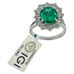 IGI Certified 18kt White Gold Italian Halo Ring with 2.40ct Emerald and Diamonds