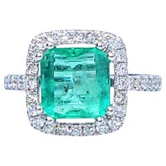 IGI certified 1.91 Carat Colombian Emerald & 0.49 Carat Diamond Ring
