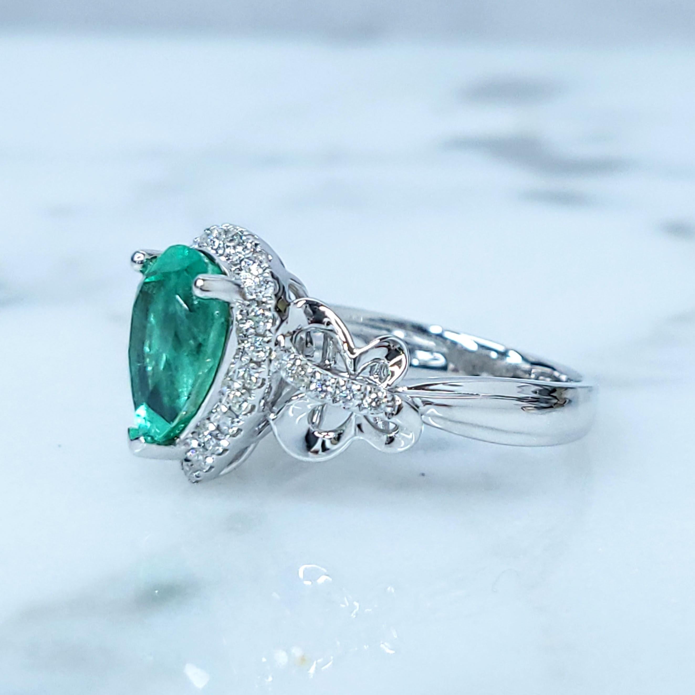 Pear Cut IGI certified 1.96 Carat Colombian Emerald & Diamond Ring in 18K White Gold For Sale