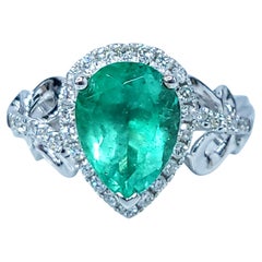 IGI certified 1.96 Carat Colombian Emerald & Diamond Ring in 18K White Gold