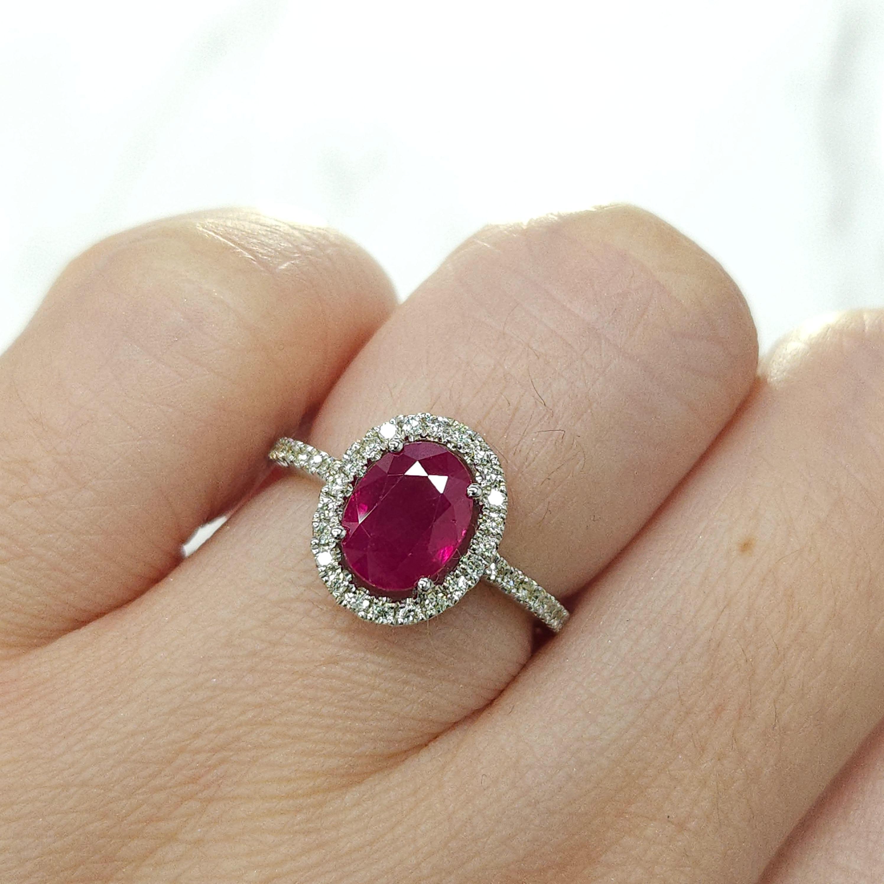 Embrace luxury and sophistication with this exquisite cocktail-style ring, featuring a mesmerizing IGI Certified 2.01 Carat Burma Ruby in a vivid purplish-red hue, elegantly shaped into an oval silhouette that radiates timeless elegance and allure.