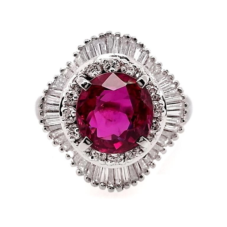 Add a touch of timeless charm to your collection with our Top Crown Jewelry House new collection of 2.05-carats untreated oval ruby amazingly set in platinum ring. The beautiful vivid purplish-red hue is certificate as 