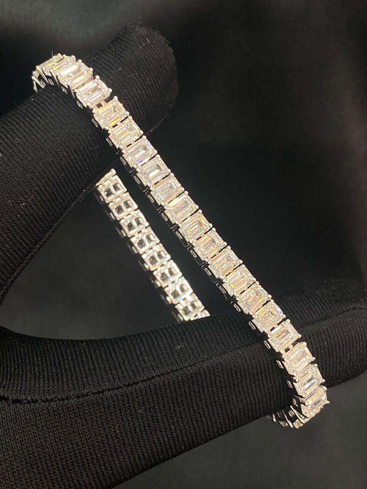 Jewels adorn us with a sparkling beauty , imbuing our lives with joy and delight .
They are precious treasures that evoke happiness and bring a glimmer of enchantment into our world.
The tennis bracelet, skillfully crafted , exudes a timeless charm