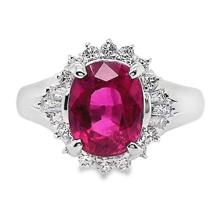Remarkable platinum ring featuring an exceptional 2.13-carat untreated natural Mozambique ruby and 0.34 carats of brilliant natural diamonds. This rare untreated ruby showcases an intense purplish-red hue in its completely natural state, making it