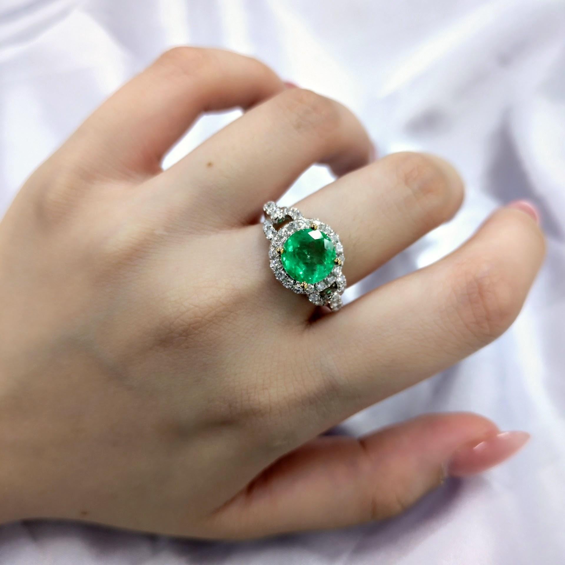 Modern IGI certified 2.23 Carat Colombian Emerald & 0.54 Carat Diamond Ring For Sale