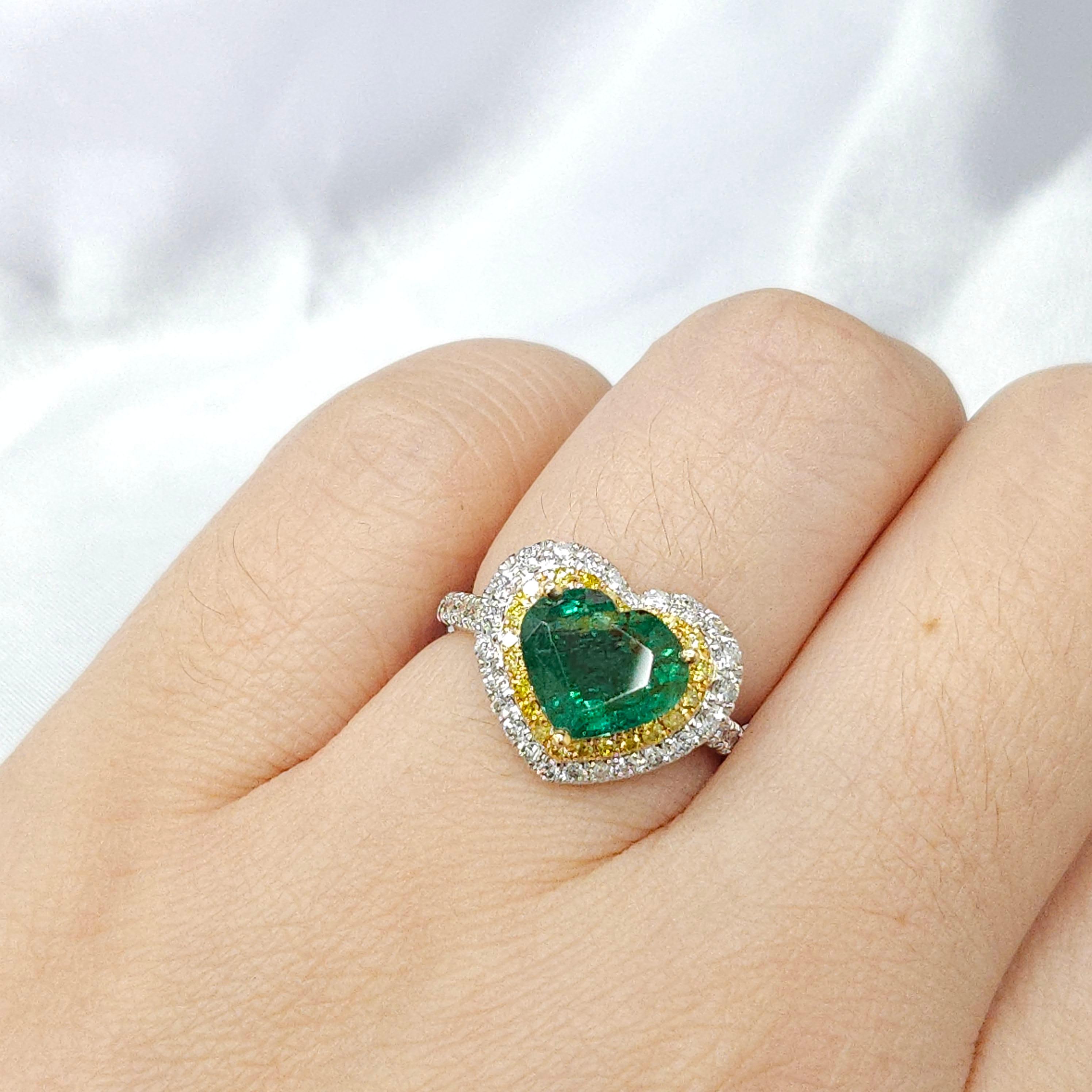 Modern IGI certified 2.28 Carat Natural Emerald & 0.59 Carat Diamond Ring For Sale