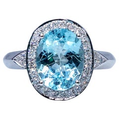Anello con Paraiba e diamanti da 2,39 carati certificati IGI in oro bianco 18 carati