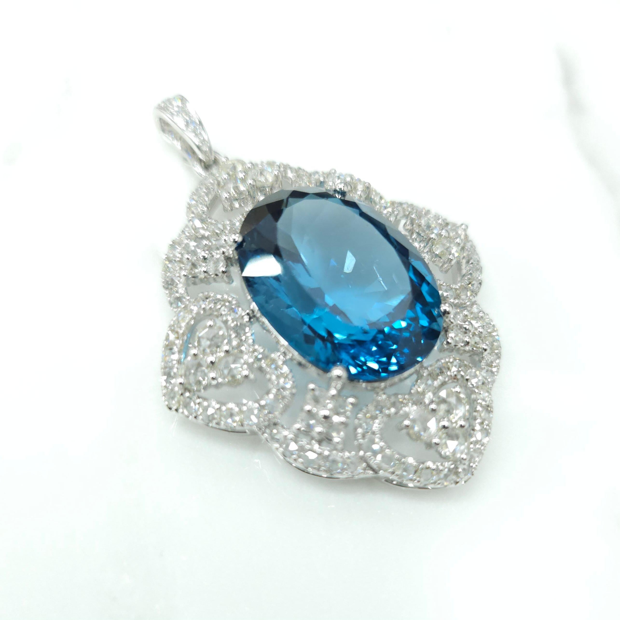Oval Cut IGI Certified 24.10 Carat Blue Topaz & Diamond Pendant in 18K White Gold For Sale