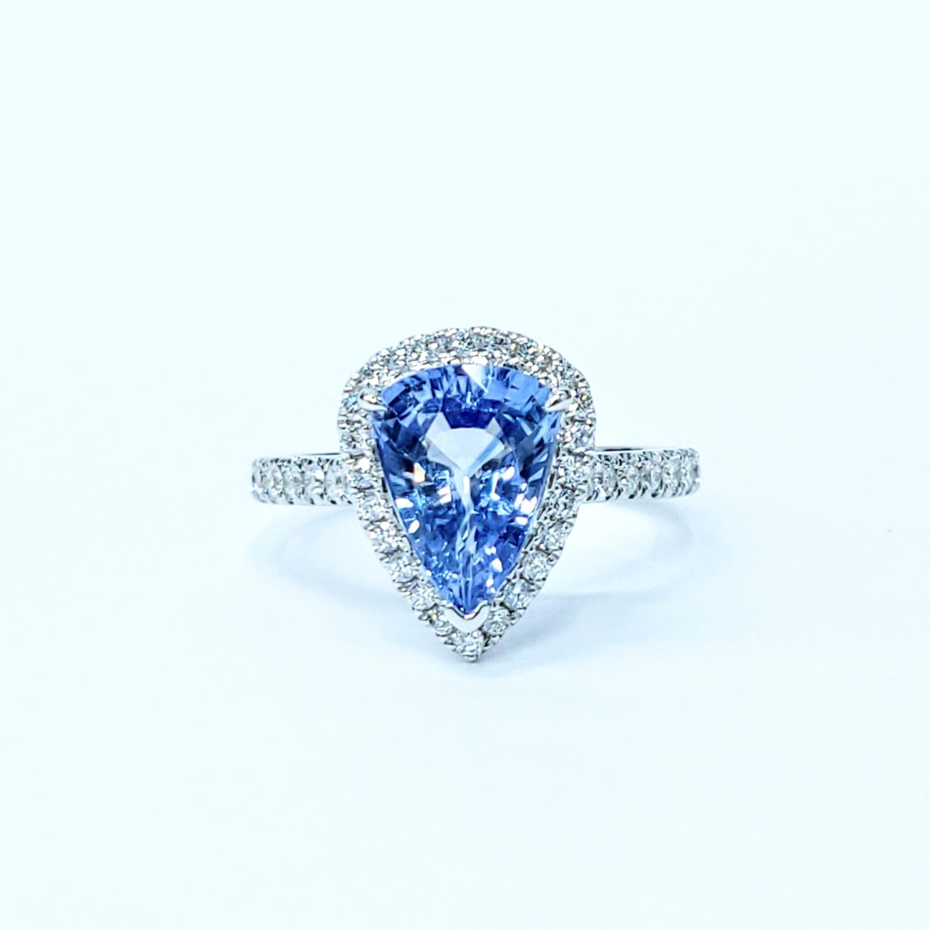 Discover the exceptional beauty of this exquisite ring, showcasing a magnificent 2.47-carat pear mixed cut sapphire of a truly captivating violetish blue hue. This unique and alluring color offers a sophisticated twist on the classic blue sapphire,