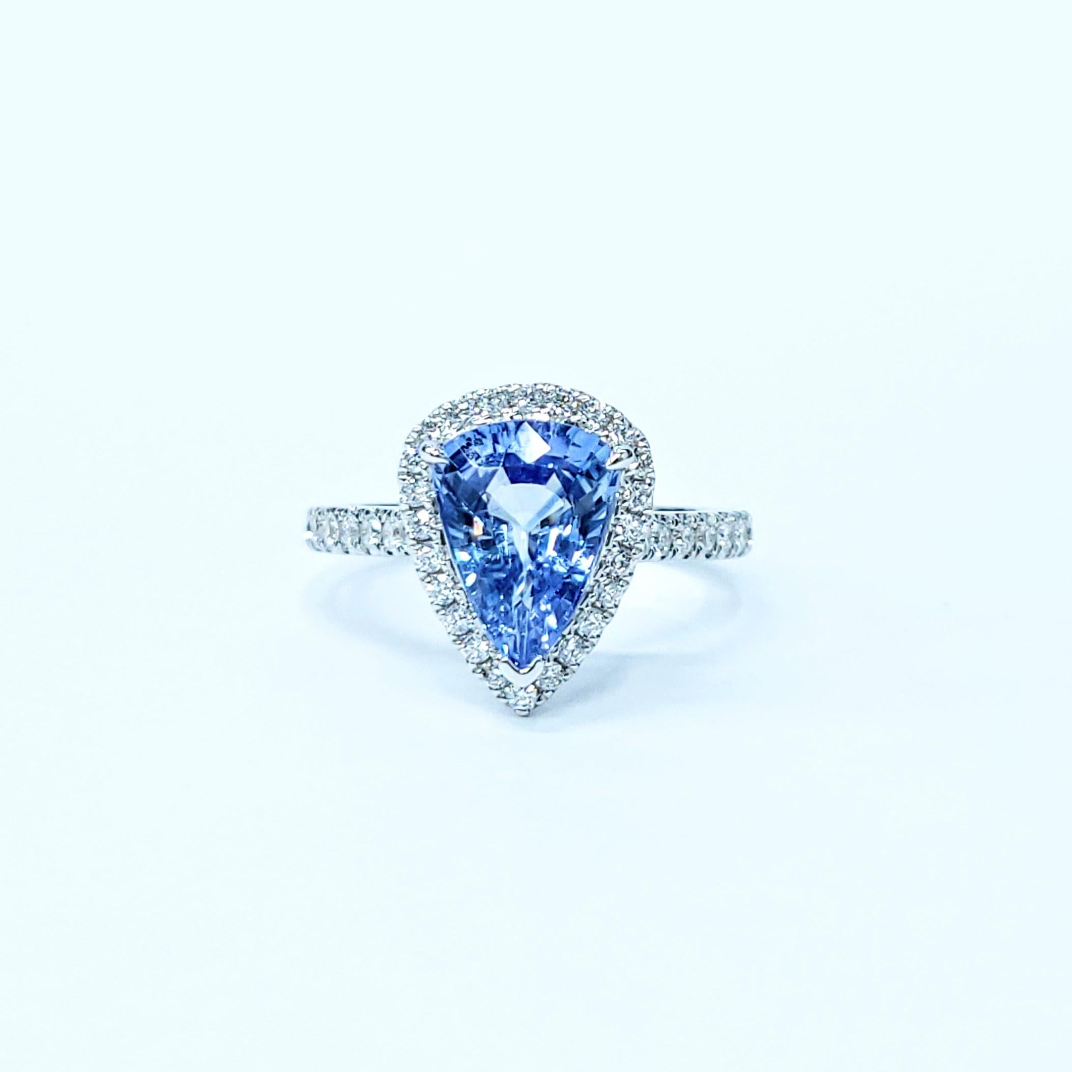 Modern IGI Certified 2.47 Carat Blue Sapphire & Diamond Ring in 18K White Gold For Sale