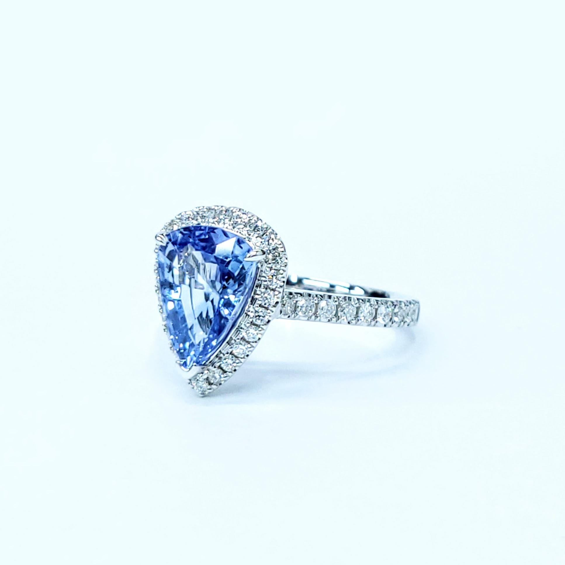 Oval Cut IGI Certified 2.47 Carat Blue Sapphire & Diamond Ring in 18K White Gold For Sale