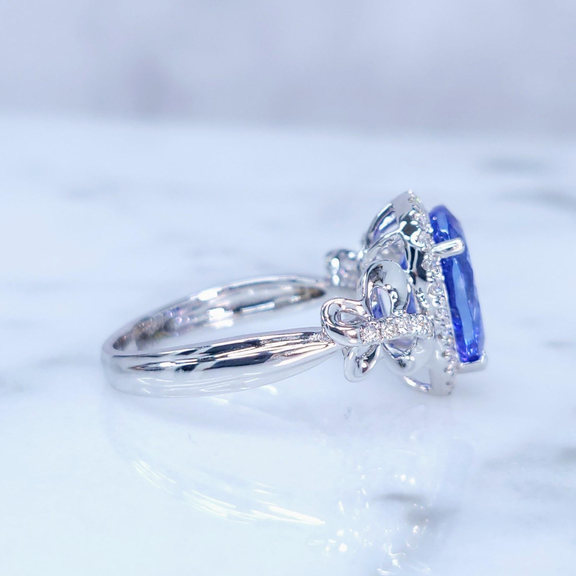 Modern IGI Certified 2.47 Carat Tanzanite & Diamond Ring in 18K White Gold For Sale