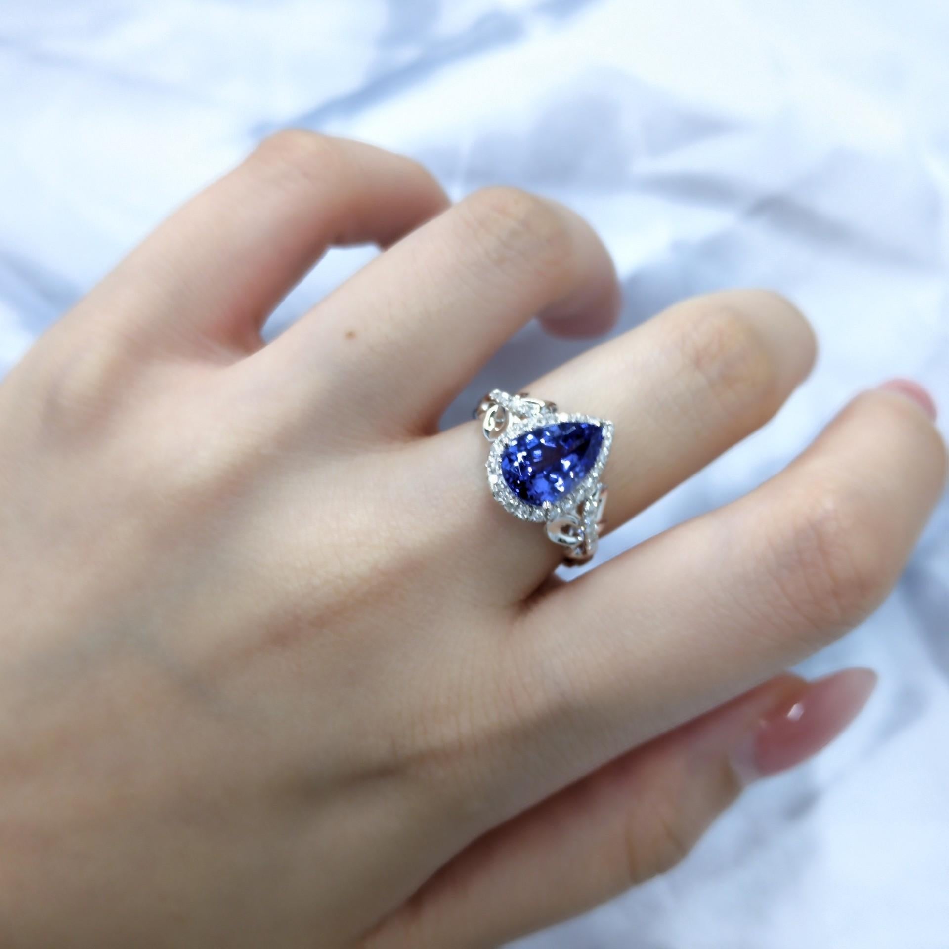 Pear Cut IGI Certified 2.47 Carat Tanzanite & Diamond Ring in 18K White Gold For Sale