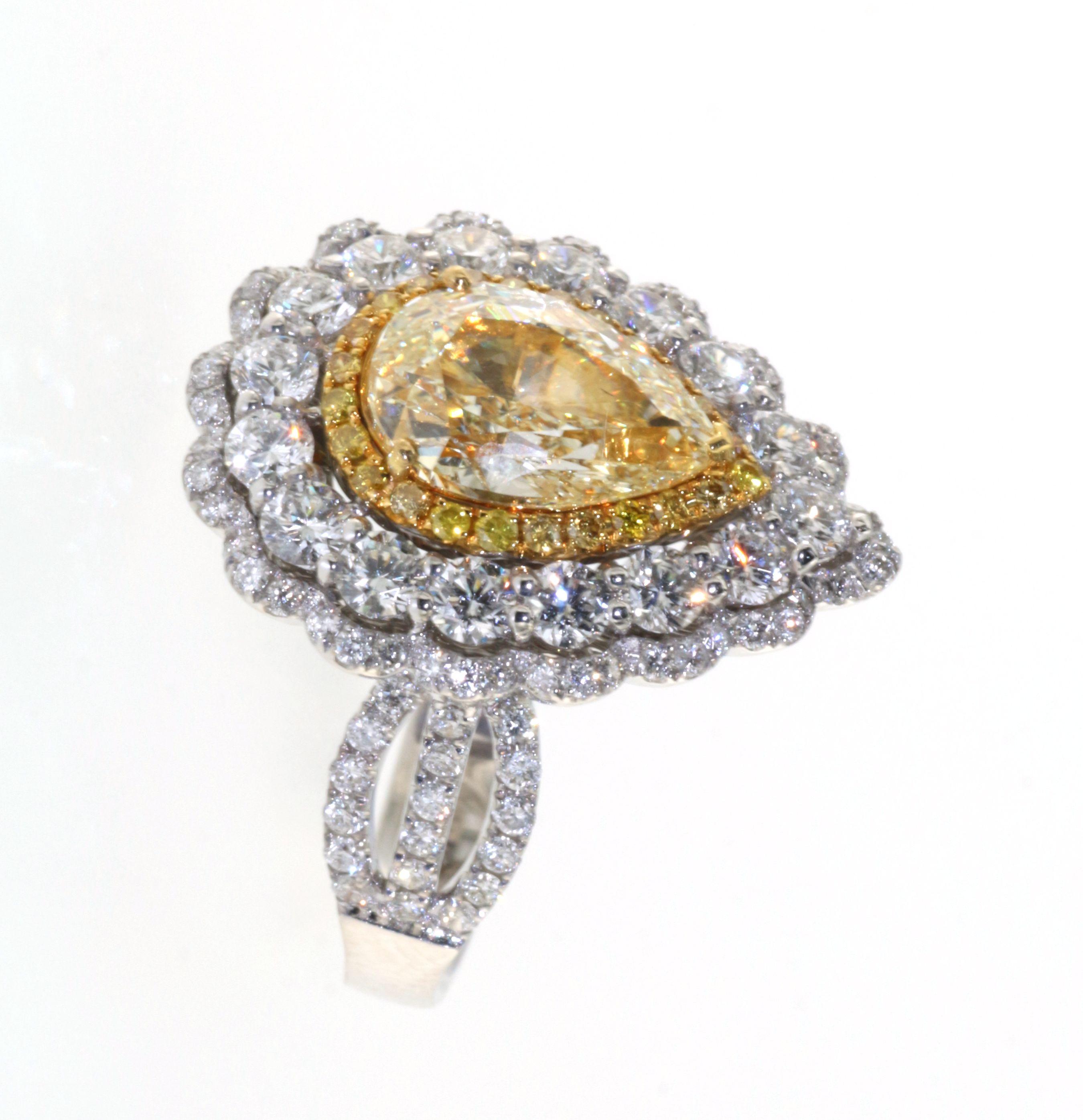 IGI Certified 2.51 Carats N Color Yellow Diamond in 18 Karat Double Diamond Halo In New Condition For Sale In Hong Kong, HK