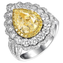 IGI-zertifizierter 2,51 Karat gelber N Farbe Diamant in 18 Karat Doppeldiamant-Halo