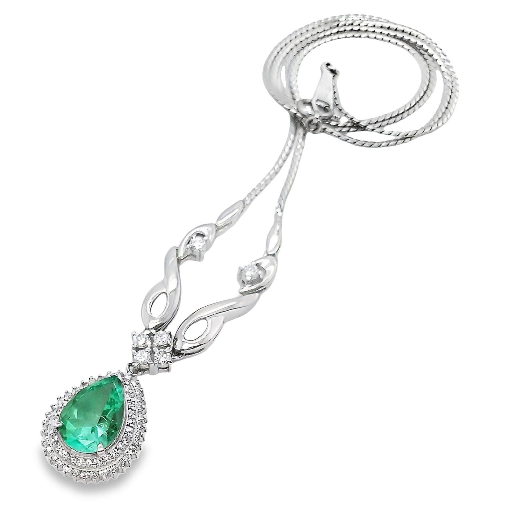 Indulge in pure luxury with this show-stopping Colombian emerald necklace, where nature's finest green gem takes centre stage. The pear-shaped pendant (25mm x 15mm) is masterfully set in platinum and embraced by brilliant-cut diamonds that dance