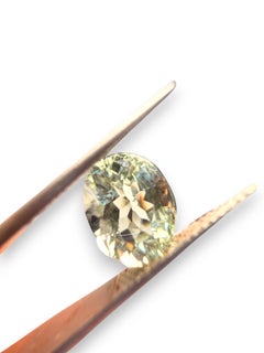 IGI Certified 2.52ct Light Yellowish Green Oval-Shaped Tourmaline Gemstone
