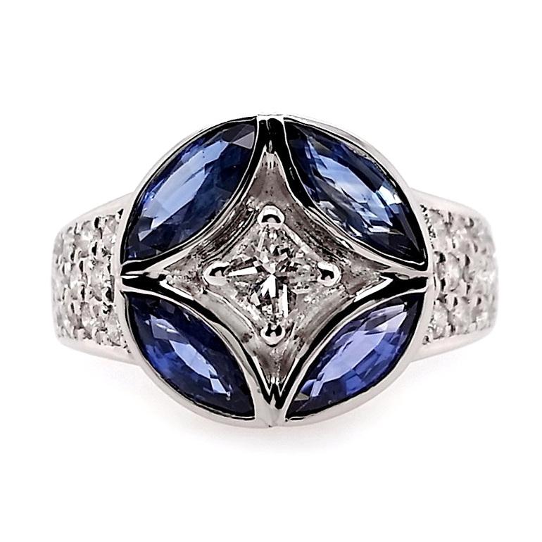 Indulge in opulence with this celestial platinum ring from Top Crown Jewelry – a breath-taking symphony of 2.59ct natural sapphires in a mesmerizing Violetish blue, elegantly dancing with 25 sparkling princess and round brilliant natural diamonds.