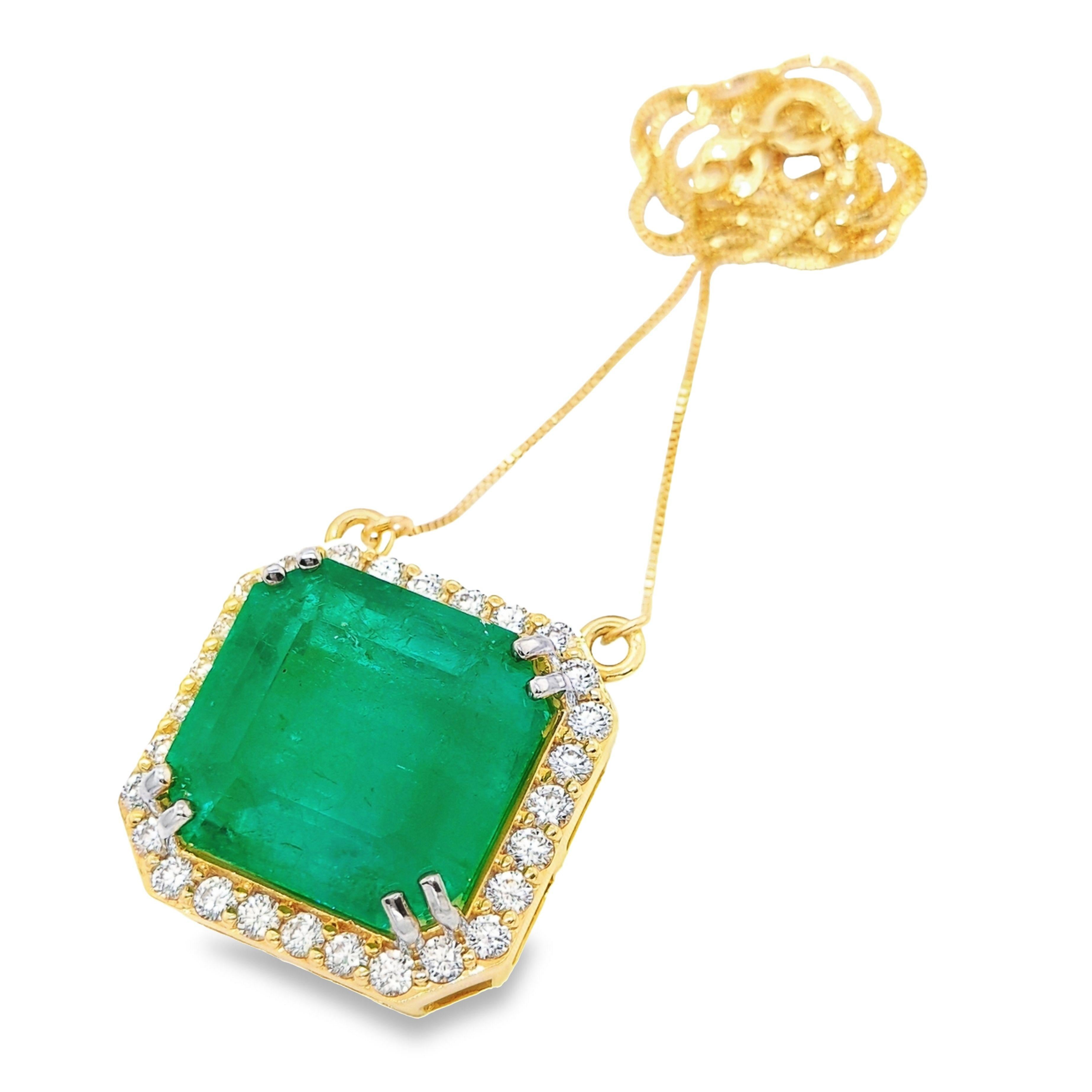 Indulge in absolute luxury with this necklace, featuring an IGI Certified 26.53ct Natural Colombia Emerald and 1.40ct Natural Diamonds set in 18KT yellow gold. The emerald's mesmerizing bluish-green hue is perfectly accented by the celestial sparkle