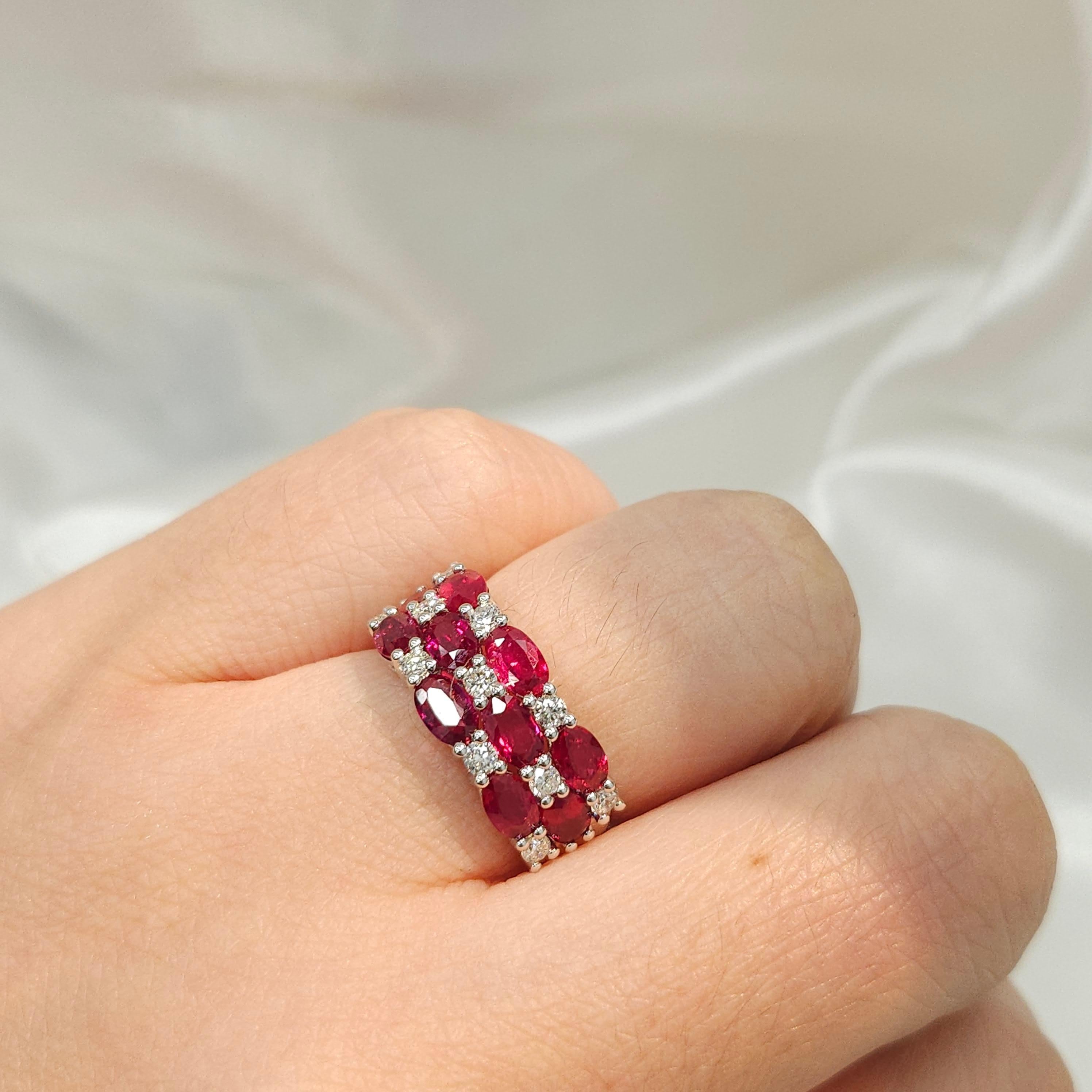 Immerse yourself in the radiant beauty of this extraordinary cocktail ring, adorned with a magnificent array of IGI Certified 2.66 Carat rubies and dazzling diamonds. Each of the 10 rubies, characterized by their intense purplish red color and long