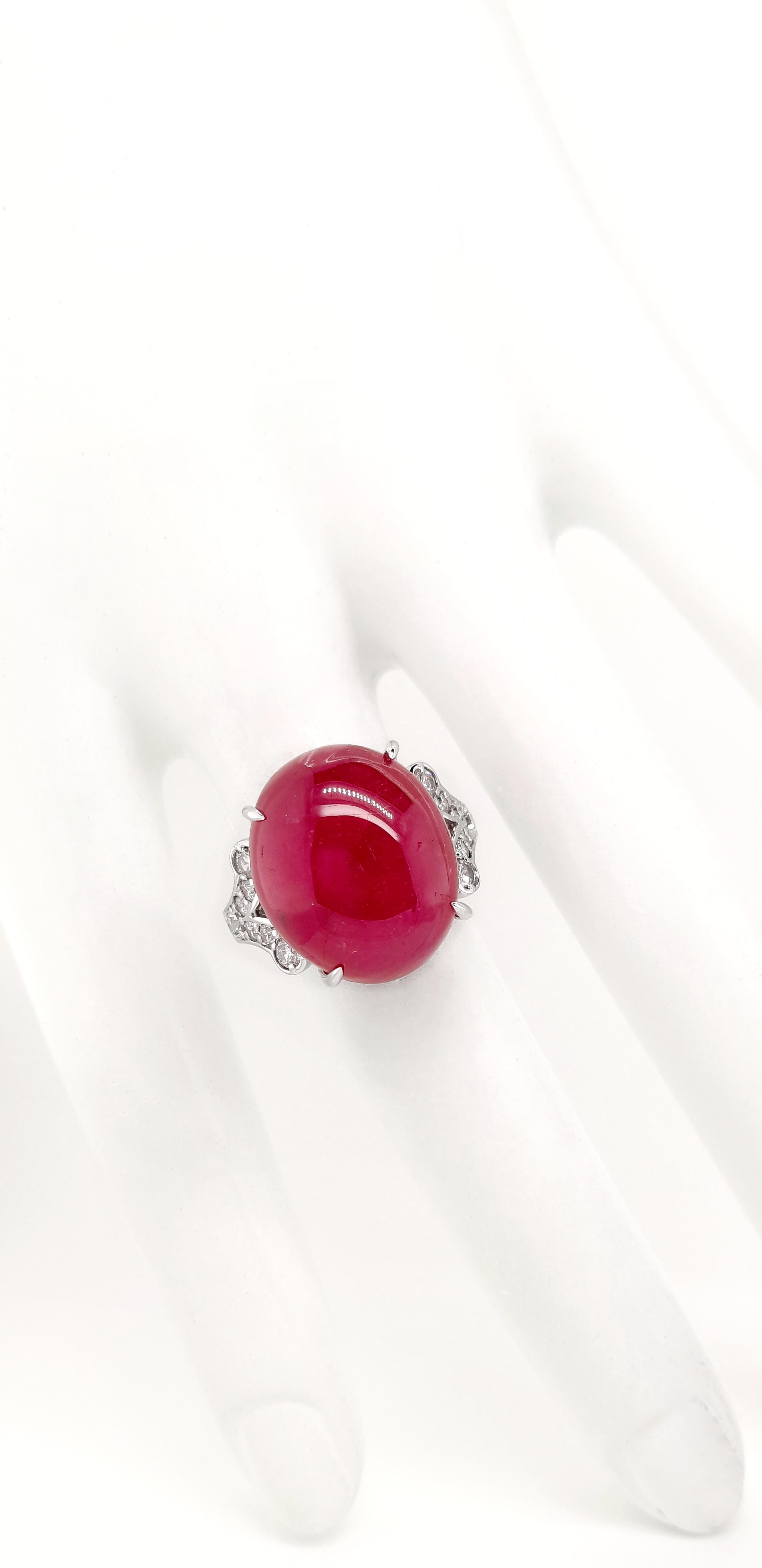 Oval Cut IGI Certified 28.34ct Natural Ruby 0.52ct Natural Diamonds White Gold Ring For Sale